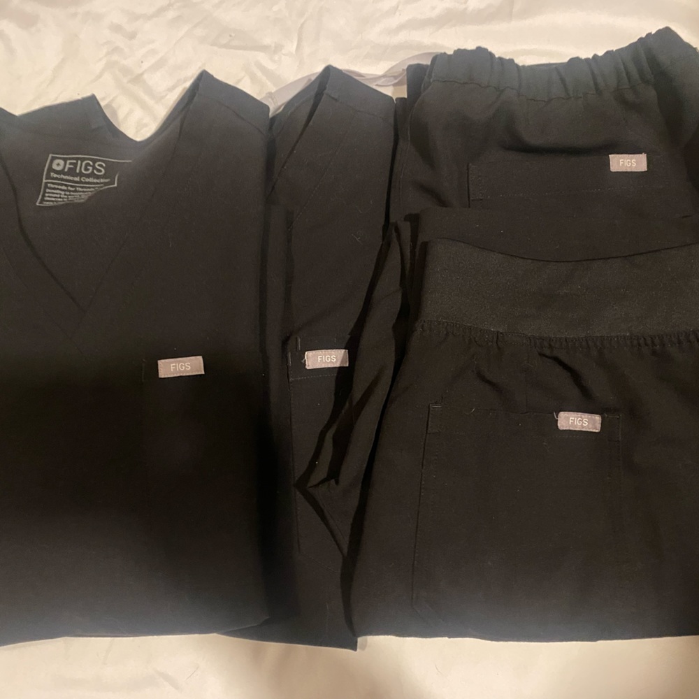 FIGS. 1 drawstring and a one pocket top left.